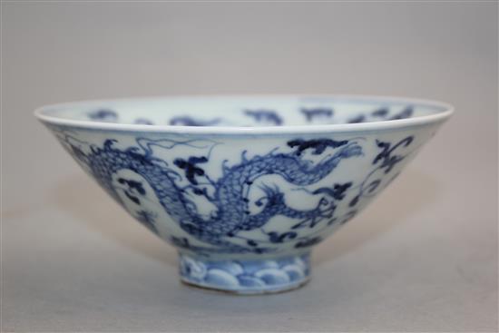 A Chinese blue and white dragon and phoenix bowl, Yongle four character mark to the interior, 15cm.